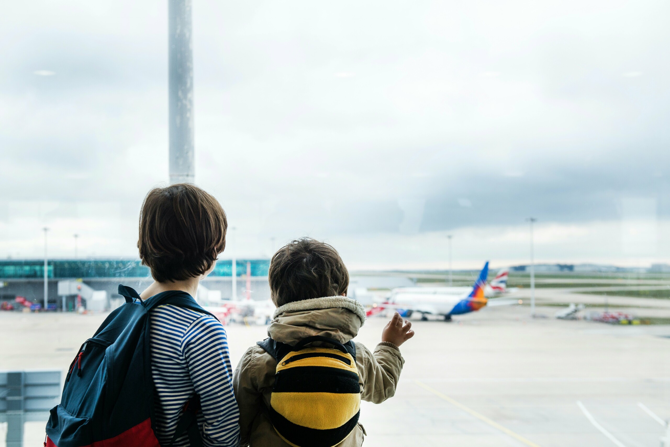 What To Pack To Survive Flying With Kids